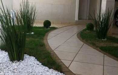 Imagem: A casa possui 3 Dormitórios, 3 Banheiros, 5 Vagas na garagem