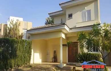 Imagem: A casa possui 3 Dormitórios, 5 Banheiros, 4 Vagas na garagem