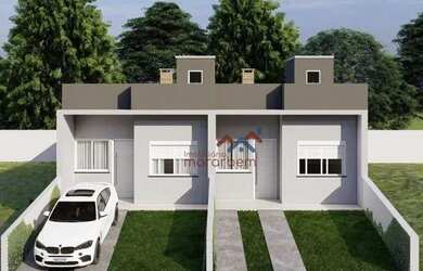 Imagem: A casa possui 2 Dormitórios, 1 Banheiro, 2 Vagas na garagem