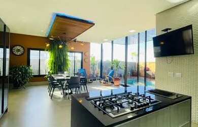 Imagem: A casa em condomínio possui 4 Dormitórios, 5 Banheiros, 3