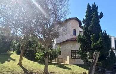 Imagem: A casa em condomínio possui 4 Dormitórios, 5 Banheiros, 5