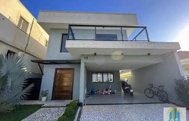 Imagem: A casa possui 3 Dormitórios, 3 Banheiros, 4 Vagas na garagem