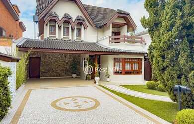 Imagem: A casa em condomínio possui 4 Dormitórios, 5 Banheiros, 4