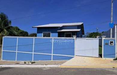 Imagem: A casa possui 3 Dormitórios, 2 Banheiros, 4 Vagas na garagem