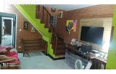 Imagem: A casa possui 4 Dormitórios, 4 Banheiros, 2 Vagas na garagem