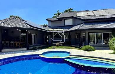 Imagem: A casa em condomínio possui 4 Dormitórios, 5 Banheiros, 5