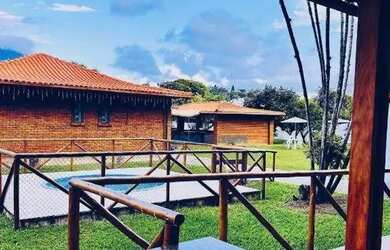 Imagem: A casa possui 5 Dormitórios, 4 Banheiros, 5 Vagas na garagem