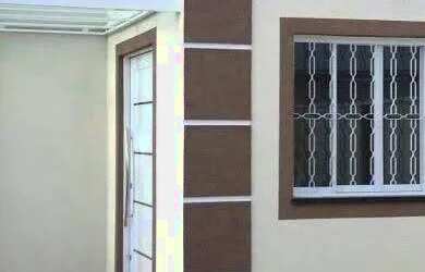 Imagem: A casa possui 3 Dormitórios, 1 Banheiro, 2 Vagas na garagem