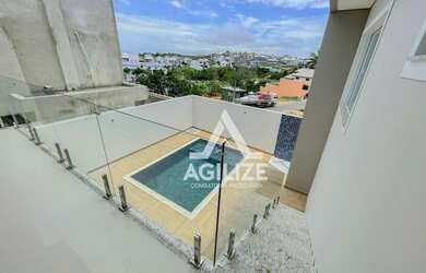 Imagem: A casa em condomínio possui 4 Dormitórios, 4 Banheiros, 2