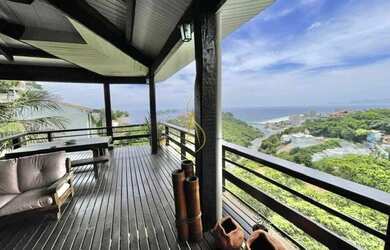 Imagem 16: Charmosa casa assinada por Zanina Caldas com encantadora vista panorâmica!