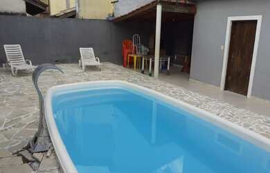 Imagem: A casa possui 3 Dormitórios, 3 Vagas na garagem e está localizado