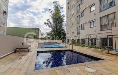 Imagem: O apartamento possui 2 Dormitórios, 1 Banheiro, 1 Vaga na garagem