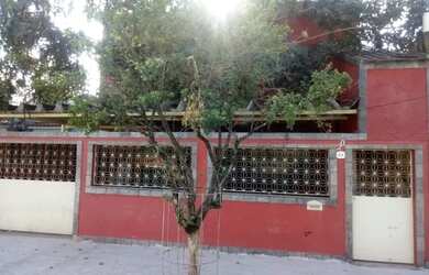 Imagem: A casa possui 5 Dormitórios, 4 Banheiros, 2 Vagas na garagem