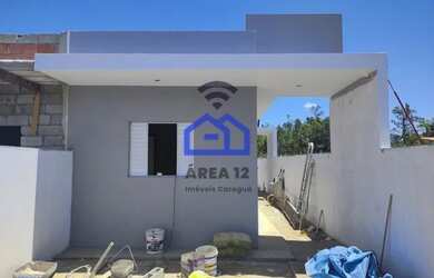 Imagem: A casa possui 2 Dormitórios, 1 Banheiro, 1 Vaga na garagem