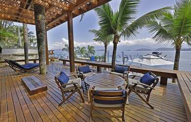 Imagem 10: Casa costeira contemporânea em condomínio exclusivo com heliponto