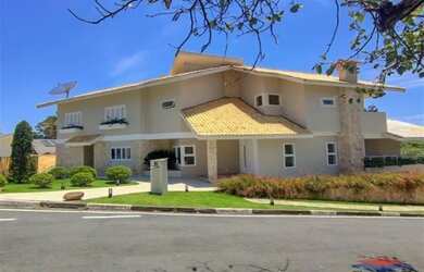 Imagem: A casa em condomínio possui 5 Dormitórios, 5 Banheiros, 5