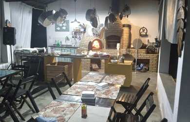 Imagem: A casa possui 3 Dormitórios, 3 Banheiros, 5 Vagas na garagem