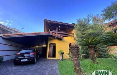 Imagem: A casa em condomínio possui 5 Dormitórios, 5 Banheiros, 4