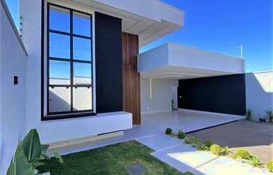 Imagem: A casa possui 3 Dormitórios, 3 Banheiros, 2 Vagas na garagem