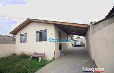 Imagem: A casa possui 4 Dormitórios, 1 Banheiro, 3 Vagas na garagem