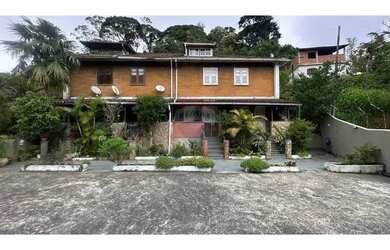 Imagem: A casa possui 2 Dormitórios, 2 Banheiros, 1 Vaga na garagem