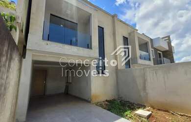 Imagem: A casa possui 3 Dormitórios, 2 Banheiros, 2 Vagas na garagem