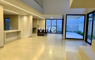 Imagem: A casa possui 4 Dormitórios, 5 Banheiros, 4 Vagas na garagem