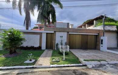 Imagem: A casa possui 4 Dormitórios, 4 Banheiros, 2 Vagas na garagem