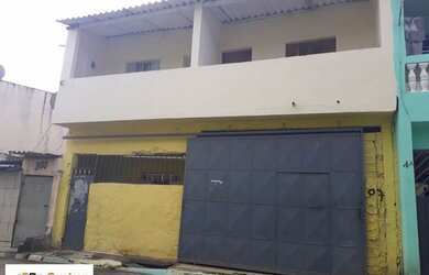 Imagem: A casa possui 3 Dormitórios, 3 Banheiros, 2 Vagas na garagem