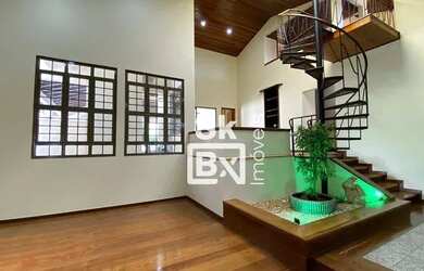 Imagem: A casa possui 5 Dormitórios, 5 Banheiros, 4 Vagas na garagem