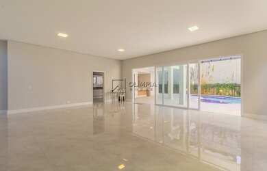 Imagem: A casa possui 4 Dormitórios, 5 Banheiros, 5 Vagas na garagem