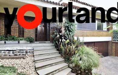 Imagem: A casa possui 3 Dormitórios, 5 Banheiros, 4 Vagas na garagem