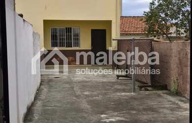 Imagem: A casa possui 2 Dormitórios, 2 Banheiros, 1 Vaga na garagem