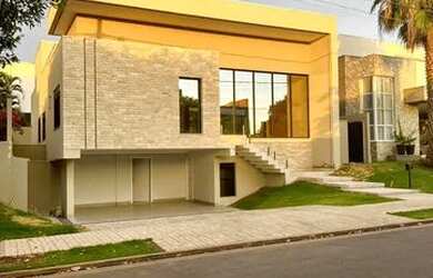 Imagem: A casa em condomínio possui 5 Dormitórios, 5 Banheiros, 2