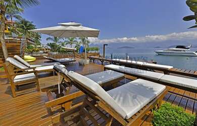 Imagem 4: Casa costeira contemporânea em condomínio exclusivo com heliponto