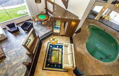 Imagem: A casa em condomínio possui 5 Dormitórios, 5 Banheiros, 5