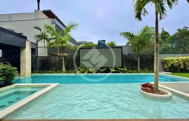 Imagem: A casa possui 5 Dormitórios, 5 Banheiros, 5 Vagas na garagem