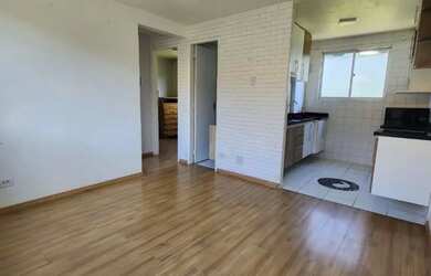 Imagem: O apartamento possui 2 Dormitórios, 1 Banheiro, 1 Vaga na garagem