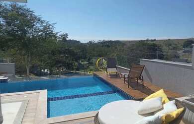 Imagem: A casa em condomínio possui 4 Dormitórios, 5 Banheiros, 5