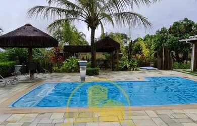 Imagem: A casa em condomínio possui 5 Dormitórios, 5 Banheiros, 5