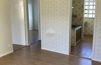 Imagem: O apartamento possui 2 Dormitórios, 1 Banheiro, 1 Vaga na garagem