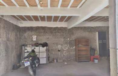 Imagem: A casa à venda possui 2 Dormitórios, 2 Banheiros e 1 Vaga