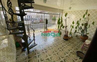 Imagem: A casa possui 3 Dormitórios, 3 Banheiros, 2 Vagas na garagem