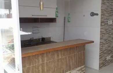 Imagem: A casa possui 2 Dormitórios, 1 Banheiro, 1 Vaga na garagem