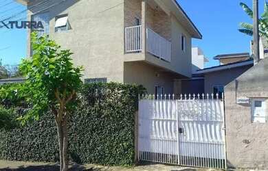 Imagem: A casa em condomínio possui 3 Dormitórios, 2 Banheiros, 1