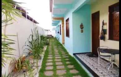 Imagem: A casa possui 2 Dormitórios, Acomodam 6 pessoas, 1 Vaga na