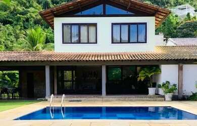 Imagem: A casa em condomínio possui 4 Dormitórios, 5 Banheiros, 4