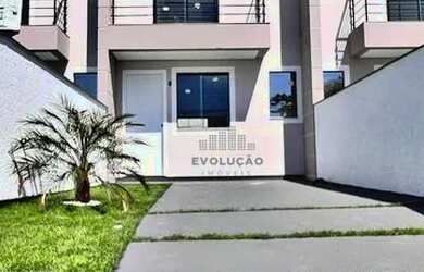 Imagem: A casa possui 3 Dormitórios, 3 Banheiros, 2 Vagas na garagem