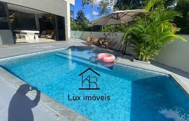 Imagem: A casa em condomínio possui 4 Dormitórios, 5 Banheiros, 5