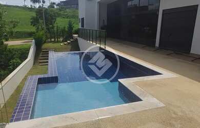 Imagem: A casa em condomínio possui 4 Dormitórios, 5 Banheiros, 2